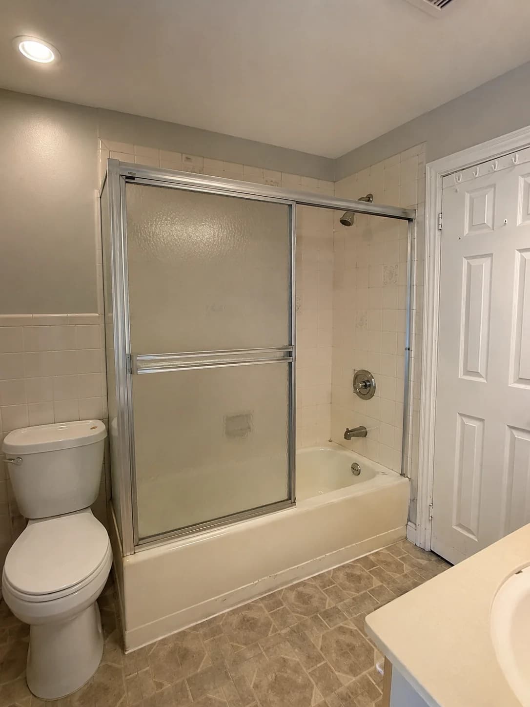 Outdated bathroom with old fixtures before renovation